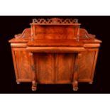 A William IV mahogany break-centre side cabinet, rectangular superstructure on turned supports,