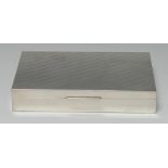 An Italian silver rectangular cigarette box, the hinged cover reeded in horizontal bands,