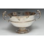 A substantial Victorian silver two-handled pedestal punch or rose bowl, quite plain,