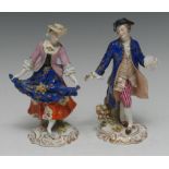 A pair of 19th century Continental figures, of a dancing gallant and companion, 17.5cm high, c.