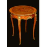 A 19th century French gilt metal mounted kingwood and marquetry circular centre table,