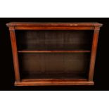 A George IV rosewood open bookcase, rectangular top above a deep frieze,