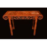 A Chinese padouk wood and burr altar table, rectangular top terminating in scrolls,