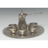 An Egyptian silver coffee service, comprising Ottoman design pot, six cups and a tray,