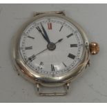 An Edwardian silver cased wristwatch head, white enamel dial, Roman numerals, red 12, minute track,