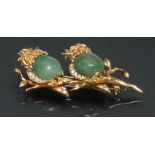 A fine quality Van Cleef and Arples emerald and diamond brooch,