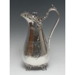 A large Victorian silver baluster wine ewer, lofty scroll handle,