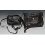 Luxury Fashion - an Italian brown ostrich skin lady's handbag, 31cm wide; another, black, 23cm wide,