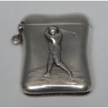 A Victorian silver waisted rectangular vesta case, embossed with a golfer, 15cm high,