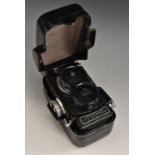 A vintage 1960s German Franke & Heidecke Rolliflex Black Baby twin lens reflex camera, Xenar lenses,
