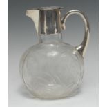 An Edwardian silver mounted flattened ovoid claret jug,