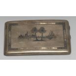 A Middle Eastern silver and niello curved rounded rectangular cigarette case,