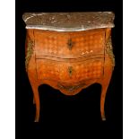 A French Transitional style gilt metal mounted mahogany,