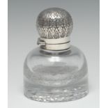 A Victorian silver mounted clear glass domed circular desk inkwell,