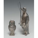 An early 20th century silver coloured metal novelty model, of an anthropomorphic penguin,