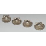 A set of four Continental silver shell shaped dishes, 9cm wide, maker ME, 7.