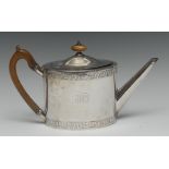 A George III silver oval teapot, bright-cut engraved borders, hinged domed cover,