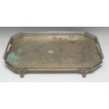 A substantial Portuguese silver canted rectangular gallery tray, pierced outswept border,