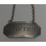 A George III Irish silver canted rectangular wine label, Martini, reeded border, 5cm wide, maker IE,