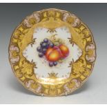 A Royal Worcester shaped circular cabinet plate, painted by John Freeman, signed,