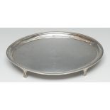 A George III silver oval teapot stand, quite plain, waisted feet, 17.