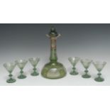 An early 20th century Bohemian green overlaid decanter and six glasses,