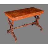 An unusually large Victorian burr walnut rounded rectangular card table,