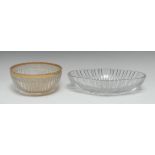 A 19th century Le Creusot oval dish, fluted cut with strawberry vertical bands, 30cm wide; another,