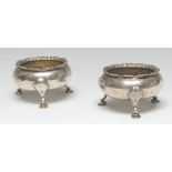 A pair of Victorian silver cauldron salt cellars, pad feet, fluted everted rim, 7.