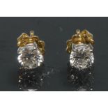 A pair of diamond stud earrings, each round brilliant cut diamond approx 0.