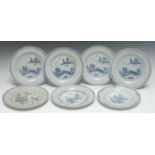 A set of four Chinese circular plates, decorated in underglaze blue with hut, pagoda, sampan,