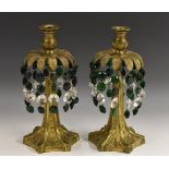 A pair of post-Regency gilt-patinated bronze lustres, as stylized exotic palms,