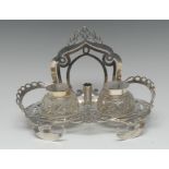 An Edwardian silver inkstand, integral letter rack above a pair of hobnail-cut clear glass wells,