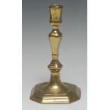 A late 17th century French brass canted square candlestick, 19cm high, c.