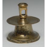 A 16th century Spanish brass capstan candlestick, pierced cylindrical sconce,