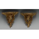 A pair of 19th century giltwood and gesso wall brackets,