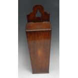 A George III oak candle box, shaped cresting pierced with an inverted heart motif,