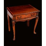 A George III rectangular lowboy, moulded crossbanded top inlaid to the angles with batwing paterae,