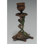 An Austrian cold-painted bronze novelty candlestick, as an upright frog riding a tortoise,