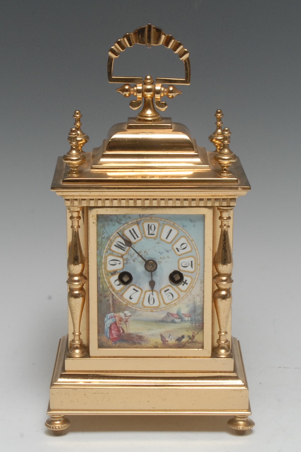 A French porcelain mounted gilt brass carriage clock, 6.
