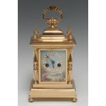 A French porcelain mounted gilt brass carriage clock, 6.