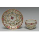 A Worcester fluted tea bowl and saucer, decorated after Sèvres in the manner of James Giles,