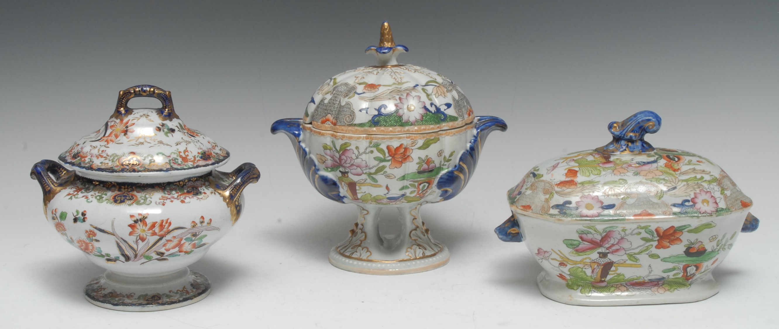 A Mason Ironstone lobed pedestal tureen and cover, printed with stylised flowers, shell handles,