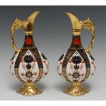 A pair of Royal Crown Derby Imari 1128 pattern Kedleston ewers, scroll handles, quatrefoil bases,