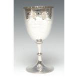 A Victorian silver pedestal goblet, bright-cut engraved with flowers,