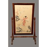 A '19th century' mahogany fire screen, the rectangular banner with a Chinese silkwork panel,