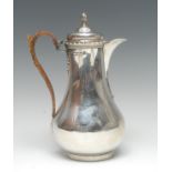 A Victorian silver baluster water jug, hinged cover with spiral-knop finial, gadrooned rim,