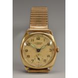 An Elizabeth II gentleman's 9ct gold wristwatch, 26mm dial inscribed J.W.