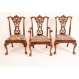 A set of six Chippendale Revival mahogany dining chairs,