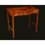 A George III mahogany serpentine side table, oversailing top with canted angles,